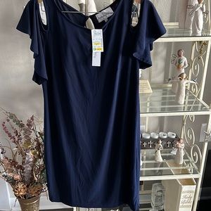 Dropped shoulders navy dress with rounded neck line.